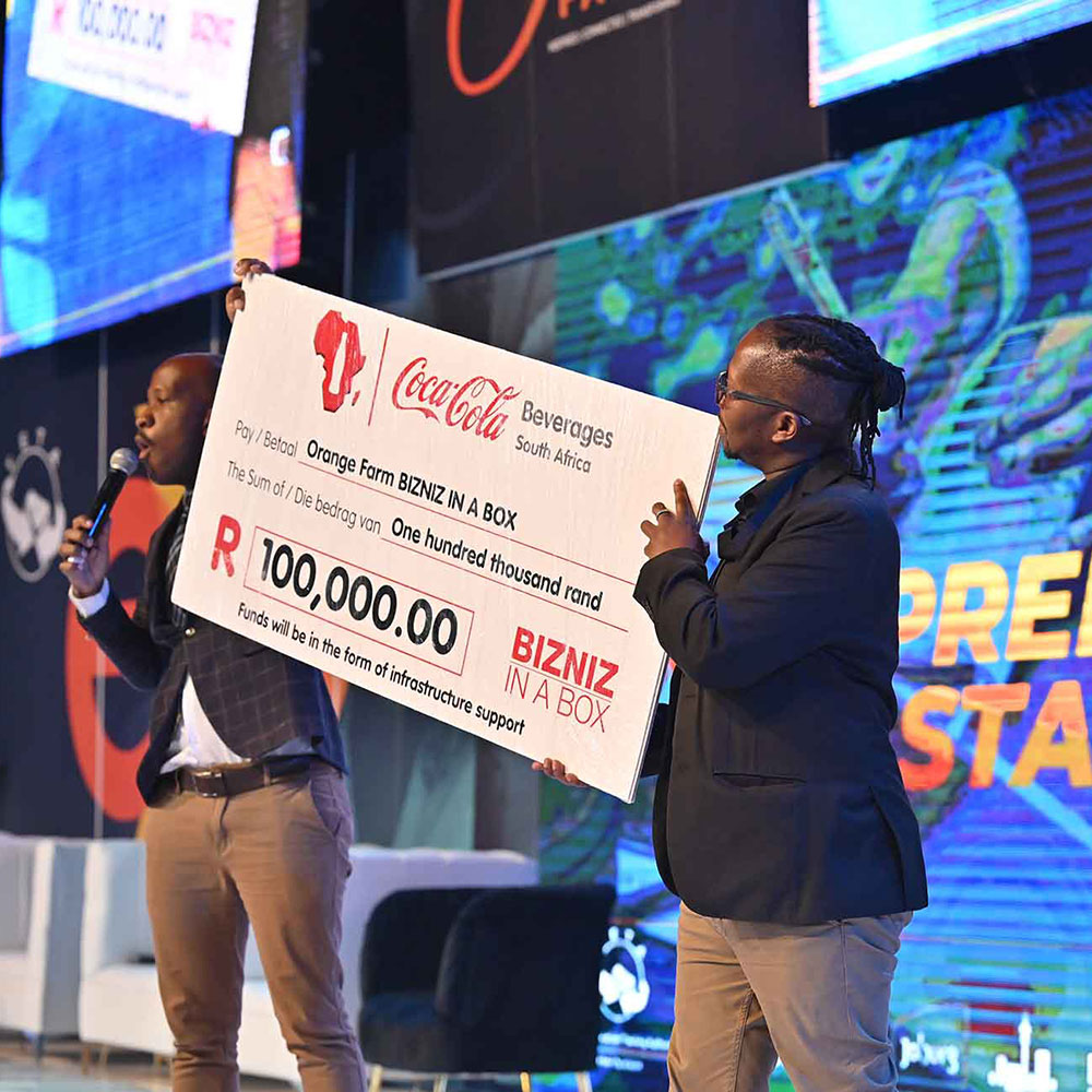 Township entrepreneur awarded R100,000 Biz-in-a-Box cheque on stage